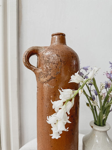 Vintage tall stoneware bottle