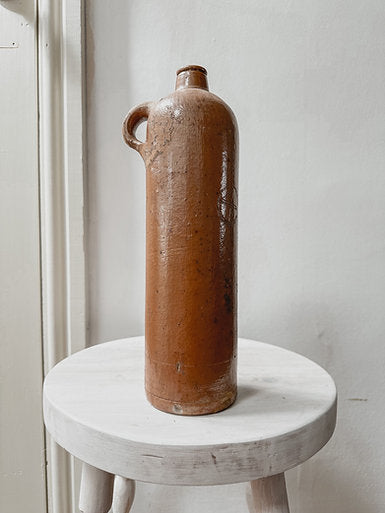 Vintage tall stoneware bottle