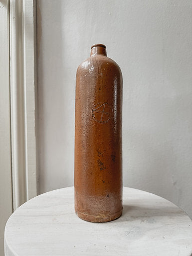 Vintage tall stoneware bottle