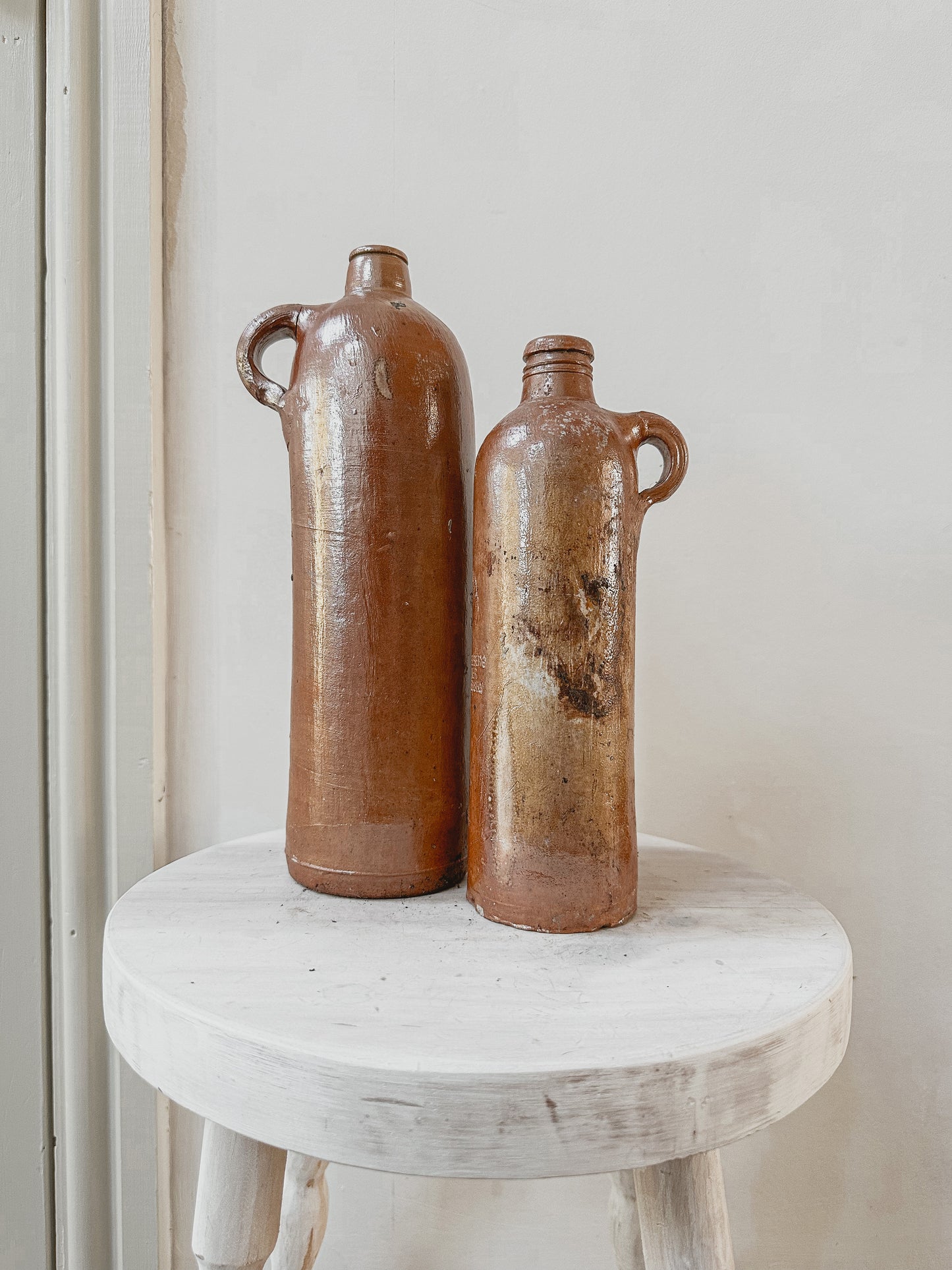 Set of two tall vintage stoneware bottles - set 2