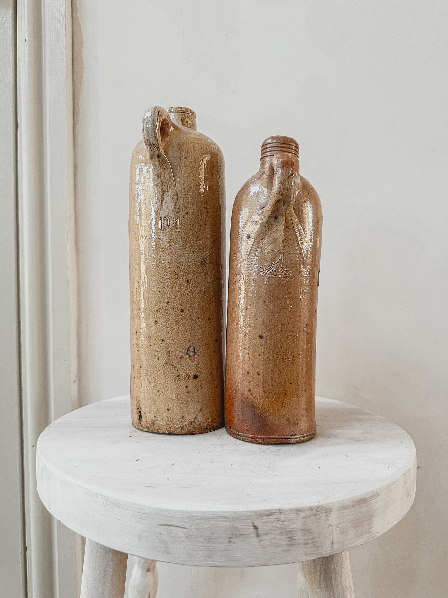 Set of two tall vintage stoneware bottles - set 1