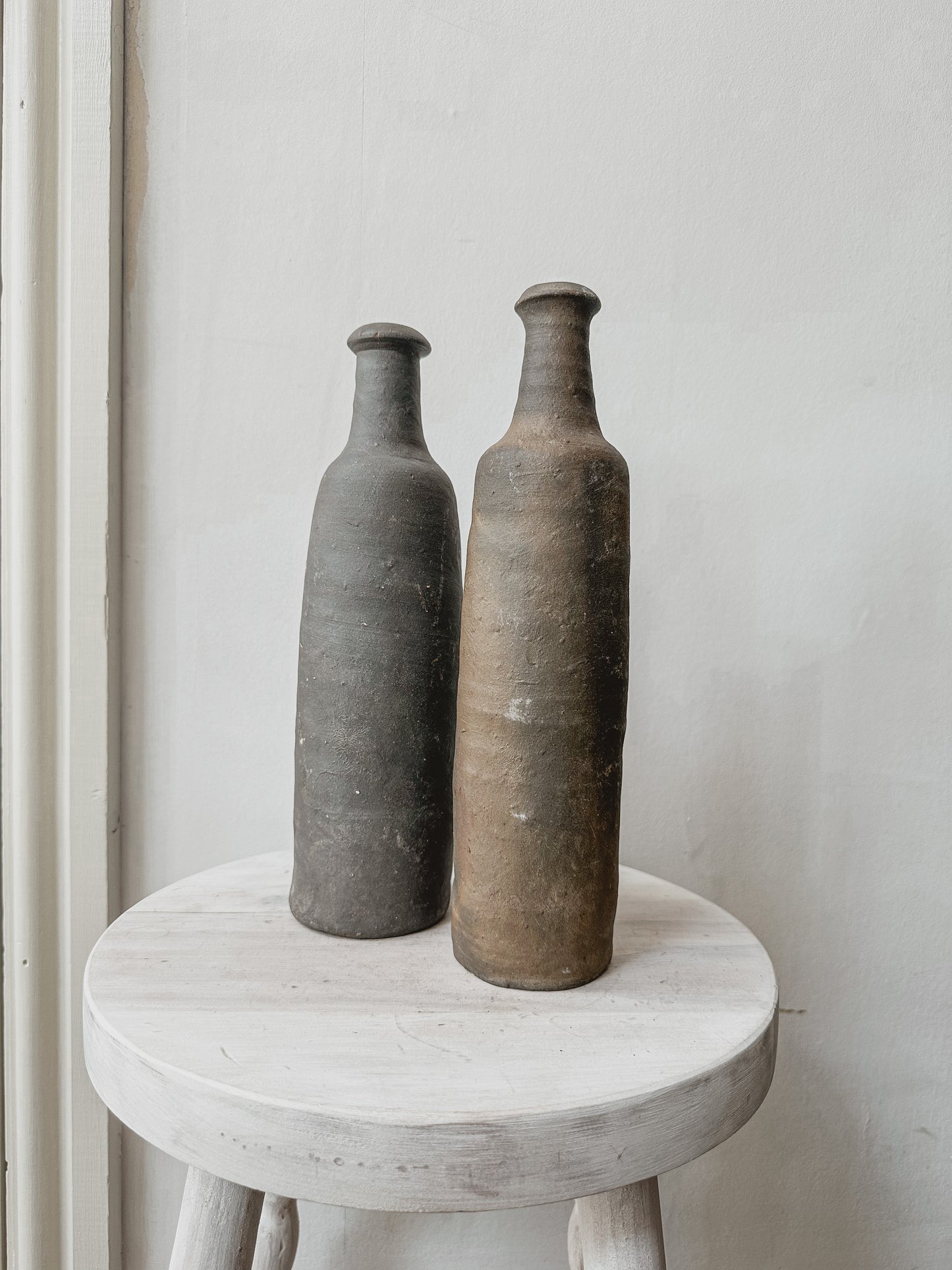 Pair antique french cider bottles