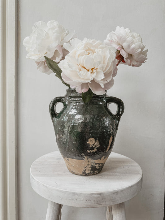 Half glazed green antique pot with handles