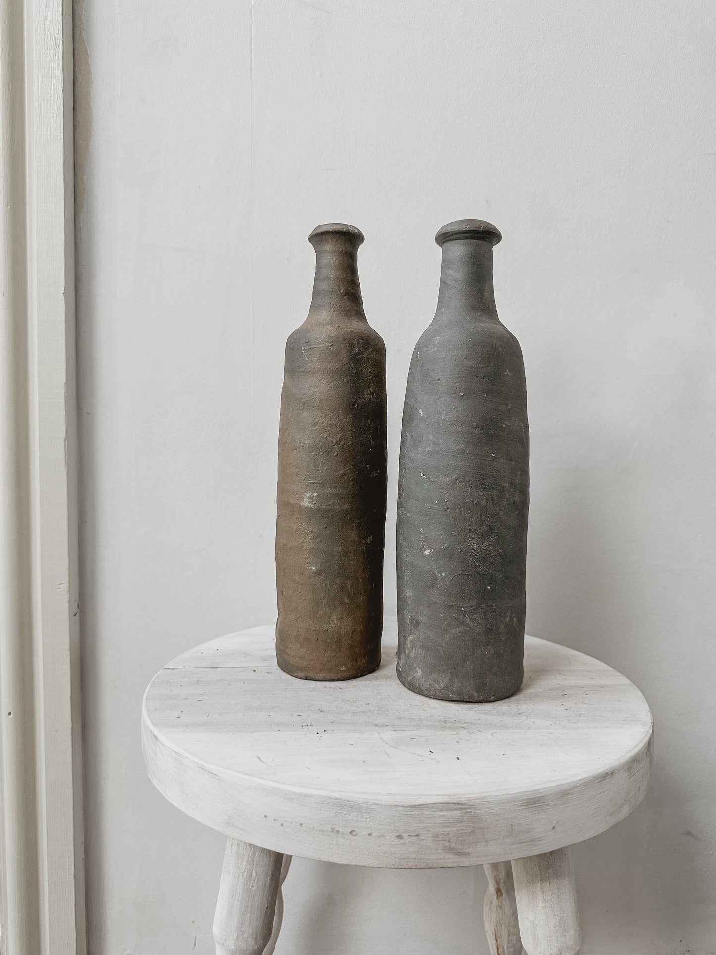 Pair antique french cider bottles